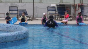 The Swim Lab Coach Teaching a Swimming Lesson at NTU One-North