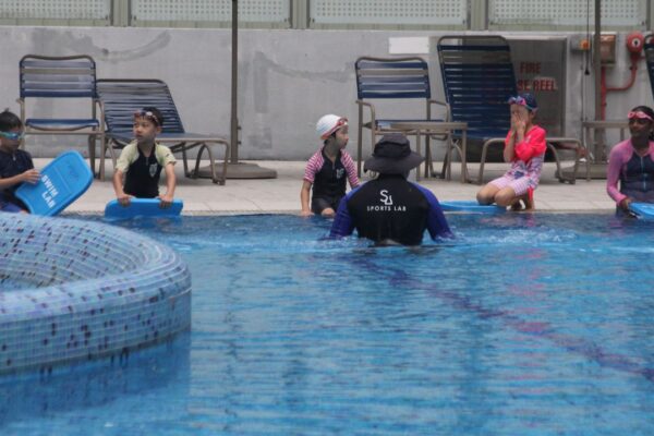 The Swim Lab Coach Teaching a Swimming Lesson at NTU One-North